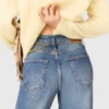 Jeans con cintura a maglie