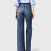 Jeans in denim a gamba larga con borchie Jeans in denim a gamba larga con borchie