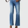 Jeans in denim con tasche Jeans in denim con tasche