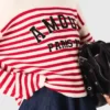 Maglione a righe in maglia a costine