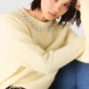 Maglione con collo gioiello rimovibile Maglione con collo gioiello rimovibile