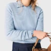 Maglione con fiocchi gioiello sul retro Maglione con fiocchi gioiello sul retro