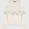 Maglione con spalle scoperte Maglione con spalle scoperte