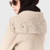 Maglione con strass e mezza zip