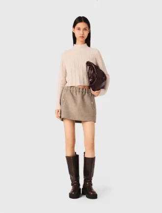Maglione corto a trecce