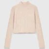 Maglione corto a trecce Maglione corto a trecce