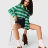 Maglione polo corto a righe