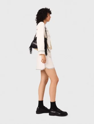 Mini gonna in maglia con impunture