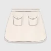 Mini gonna in maglia con impunture Mini gonna in maglia con impunture
