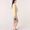 Mini M Bag in pelle goffrata con catena Mini M Bag in pelle goffrata con catena