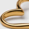 Orecchini a cerchio a forma di cuore placcati in oro Orecchini a cerchio a forma di cuore placcati in oro