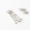 Orecchini a stella con strass Orecchini a stella con strass