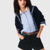 Pantaloncini in tweed con dettagli in denim Pantaloncini in tweed con dettagli in denim