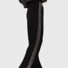 Pantaloni con fascia in strass Pantaloni con fascia in strass
