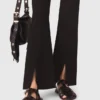 Pantaloni con spacchi Pantaloni con spacchi
