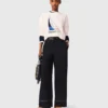 Pantaloni in cotone con cintura in pelle Pantaloni in cotone con cintura in pelle