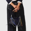 Pantaloni in cotone con cintura in pelle Pantaloni in cotone con cintura in pelle