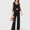 Pantaloni in maglia con gioielli
