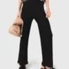 Pantaloni in maglia con gioielli