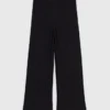 Pantaloni in maglia con gioielli