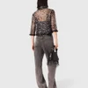 Top con paillettes floreali