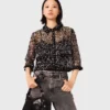 Top con paillettes floreali