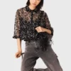 Top con paillettes floreali