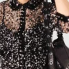 Top con paillettes floreali