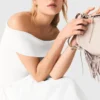 Top con scollo bardot in maglia a costine Top con scollo bardot in maglia a costine