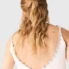 Top corto in taffetà con collo impreziosito da gioielli