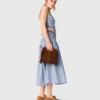 Top in cotone smockato con strass Top in cotone smockato con strass