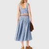 Top in cotone smockato con strass Top in cotone smockato con strass