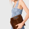 Top in cotone smockato con strass Top in cotone smockato con strass
