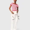 Top in maglia a righe con scollo a barchetta