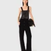 Top in maglia con spalline e strass
