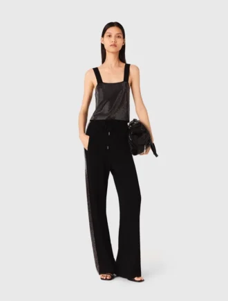 Top in maglia con spalline e strass