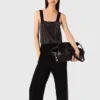Top in maglia con spalline e strass