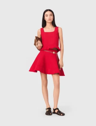 Top in maglia con volant