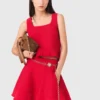 Top in maglia con volant