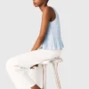 Top in maglia con volant