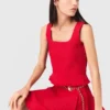 Top in maglia con volant