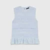 Top in maglia con volant