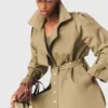Trench con borchie Trench con borchie