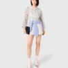 Tuta in tweed con paillettes