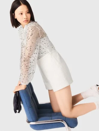 Tuta in tweed con paillettes