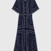 Vestito lungo fluido con motivi